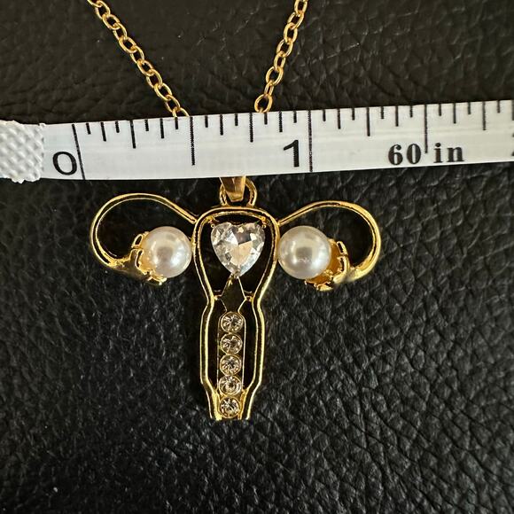 Woman’s Uterus Gold tone Necklace - Picture 4 of 4